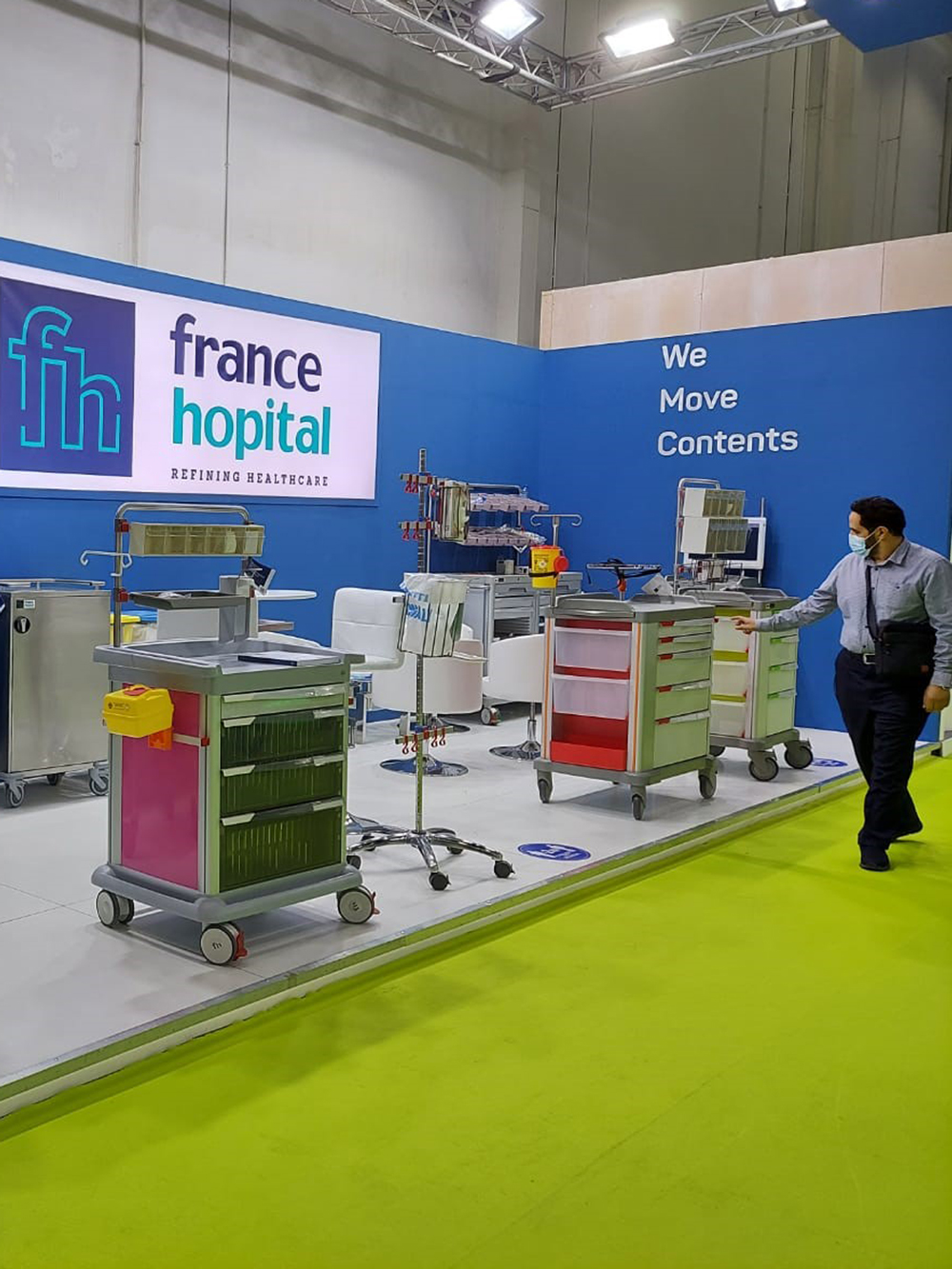 a person looks at FH's stand at Arab Health 2022