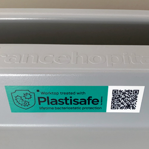 a Plastisafe sticker on a PRECISO worktop denotes the permanently sanitizing treatment it received
