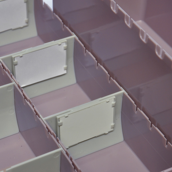 medication bins in mauve coloure with dividers